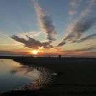 Wolkenstern beim Sonnenuntergang am Vejers Strand