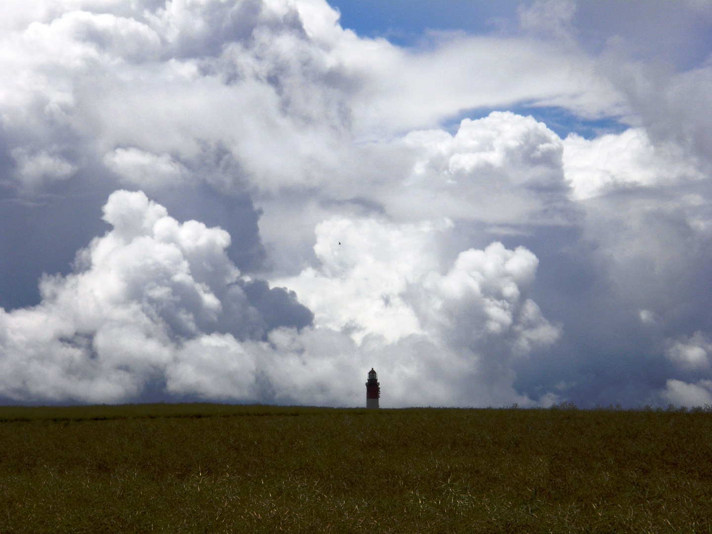 Wolkentheater mit Leuchtturm