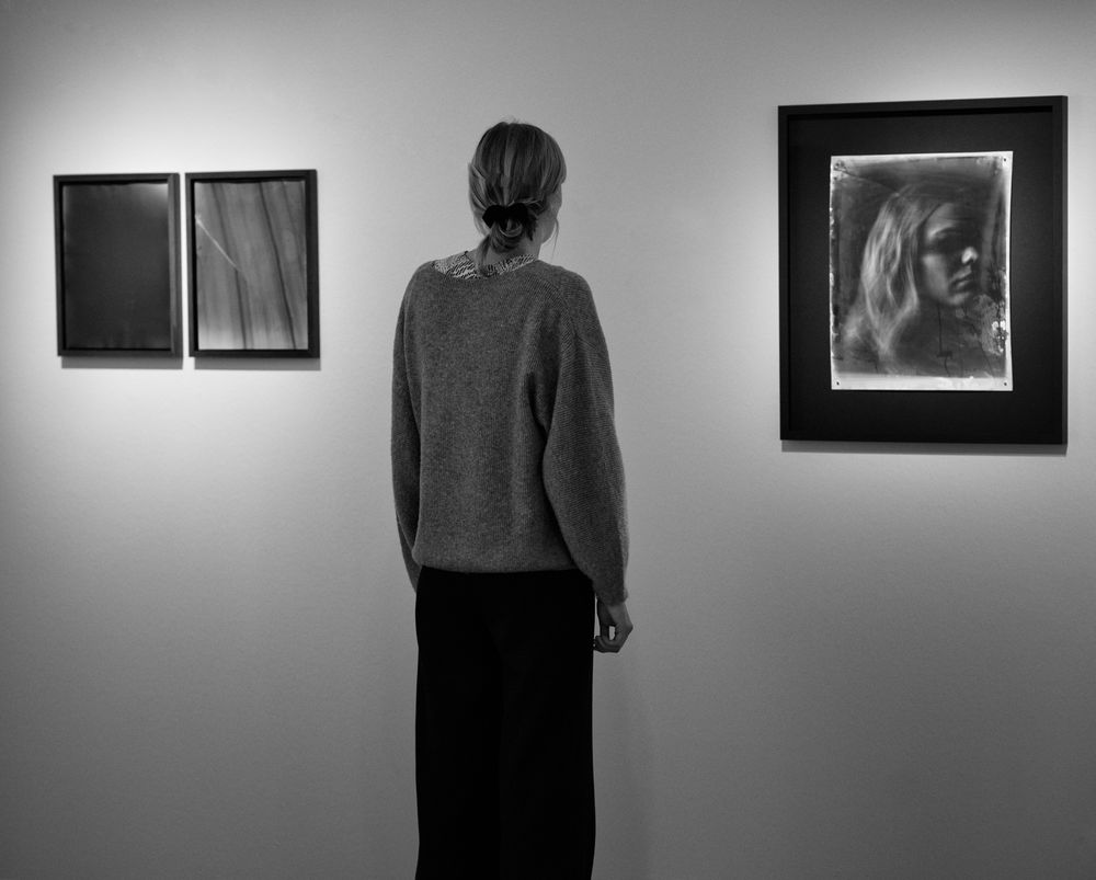 Woman between art