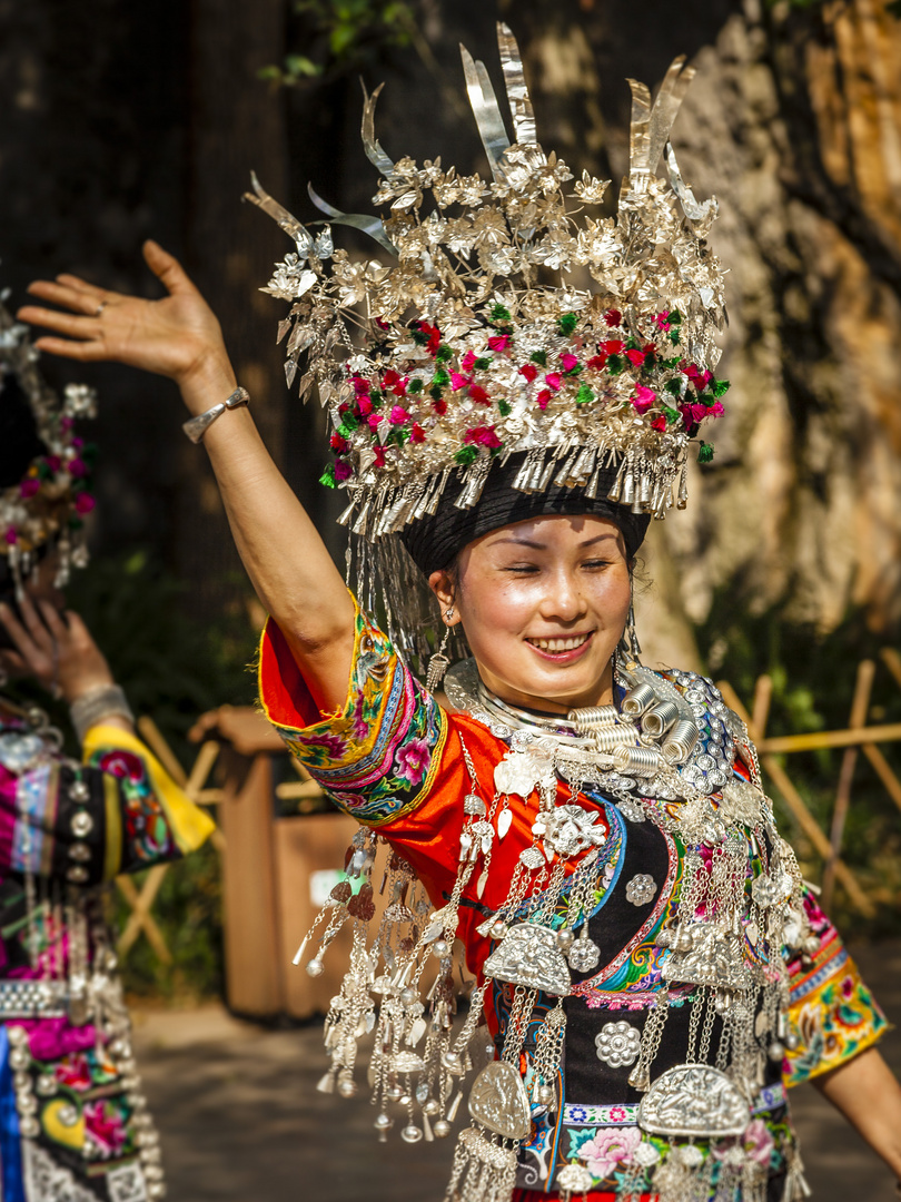 Woman from Miao Minority having fun