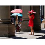 Woman in red with ice-cream cup