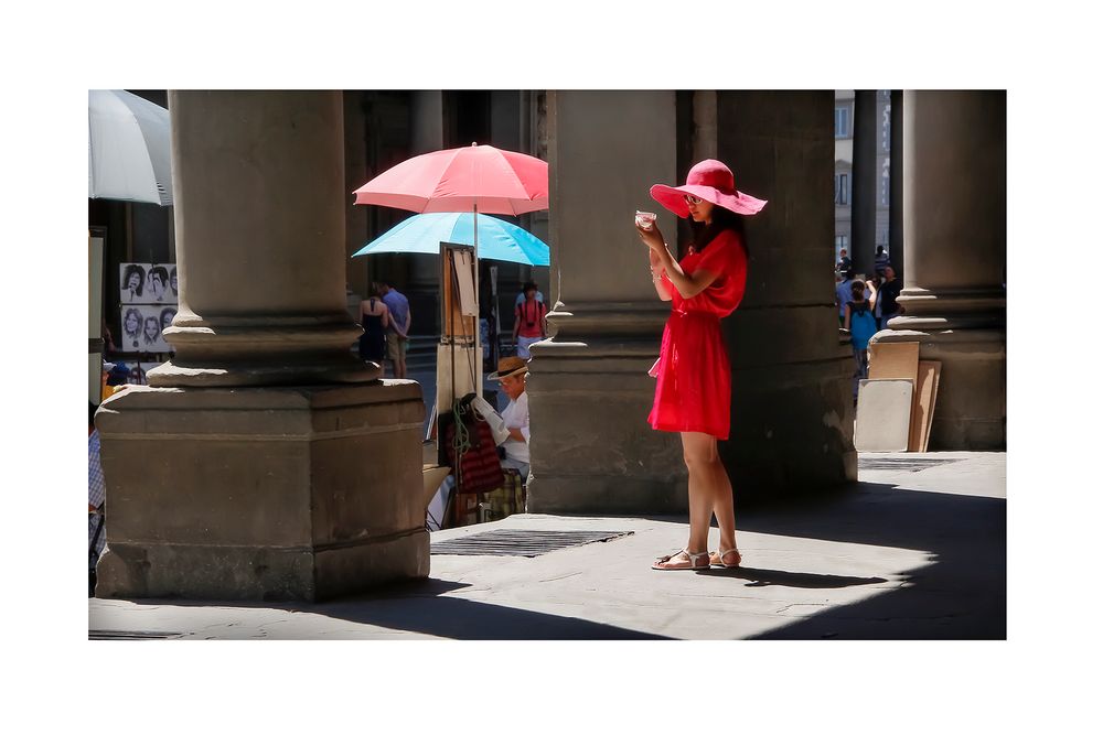 Woman in red with ice-cream cup