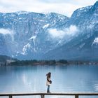 Woman on a bridge in the Austrian Alps