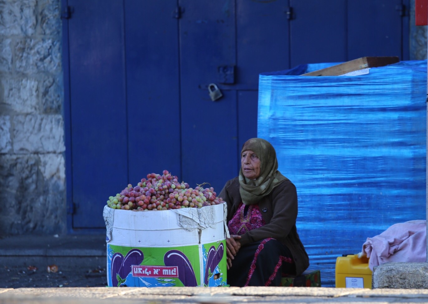 Woman selling grapes