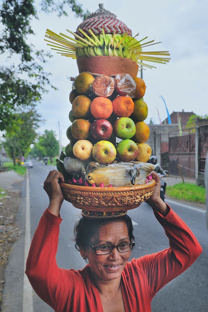 Woman with her offering