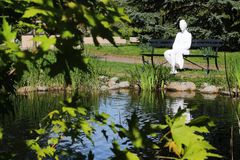 woman with sunglasses on bench