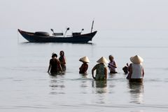 Women bathing near Lang Co