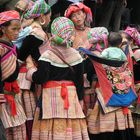 women gossiping at local market