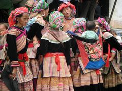 women gossiping at local market