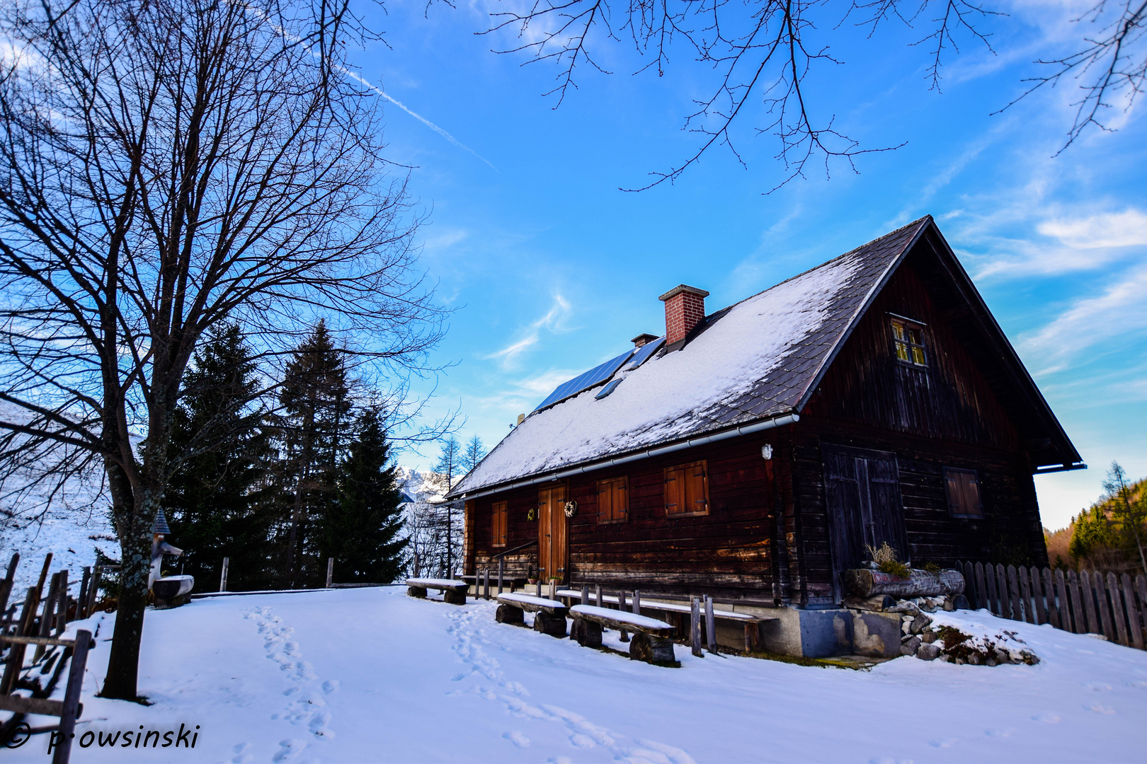 Wooden Cottage in Winter