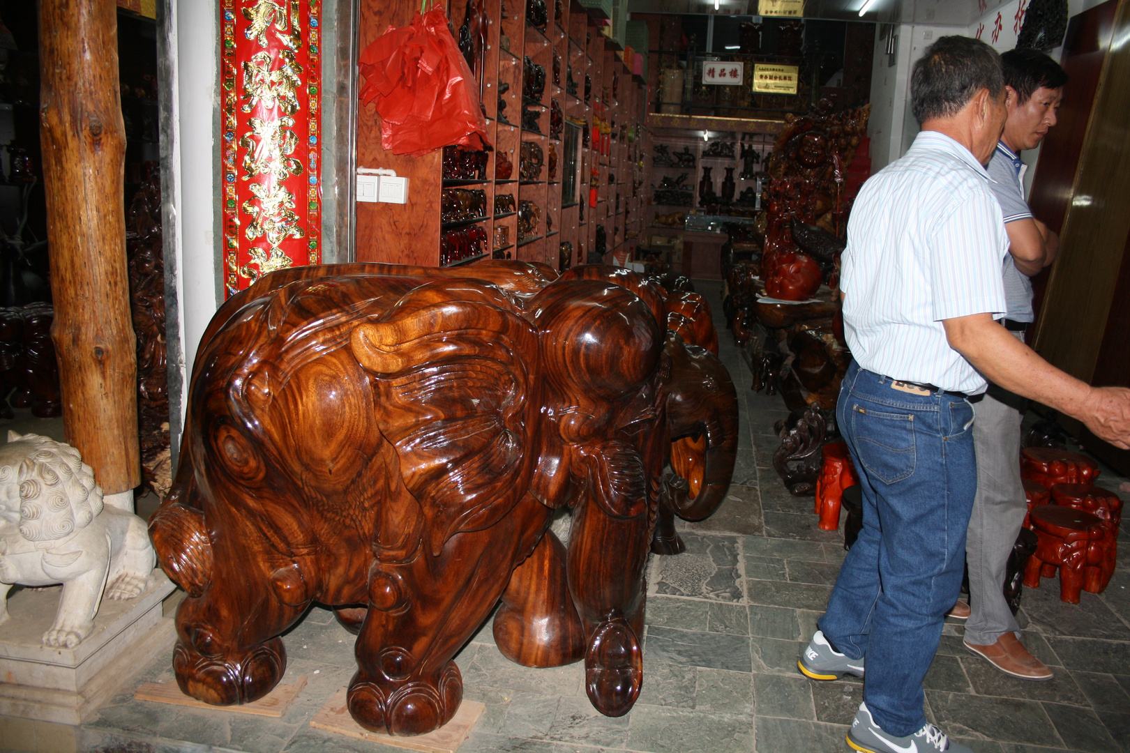 wooden elephants in Jinghong