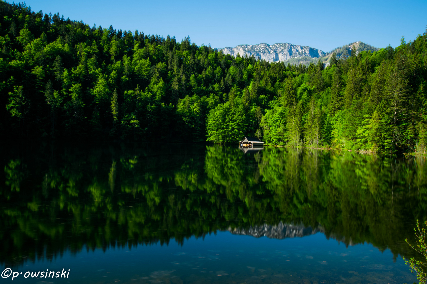 Wooden hut at lake