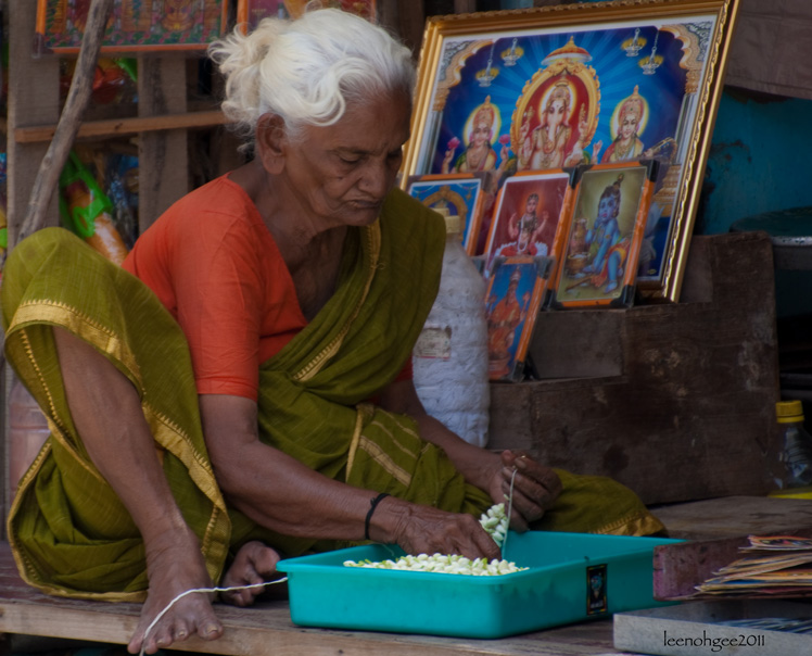 Working Indian old lady