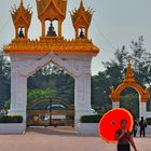 Worshiper enters the holy Pha That Luang