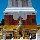 Worshipper girl in front of the altar