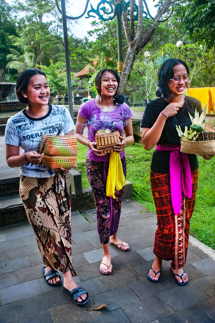 Worshippers bring their offerings