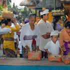 Worshippers prepare the offerings