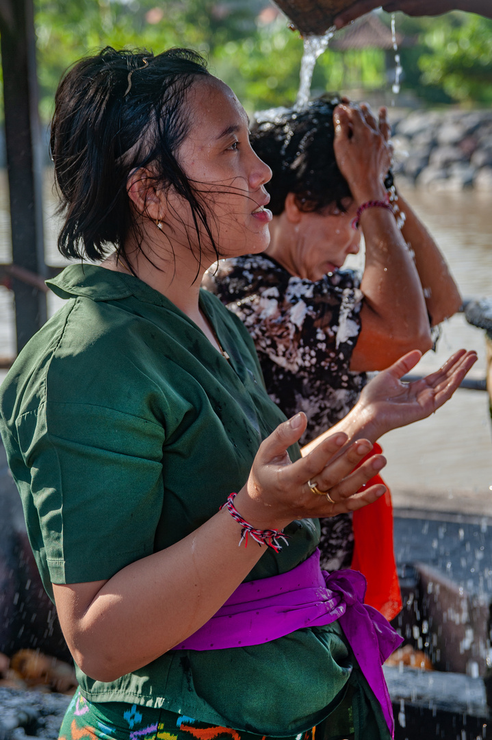 Worshippers splashed with holy water