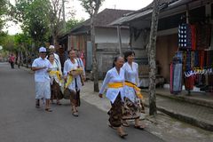Worshippers walk to Pura Gunung Kawi