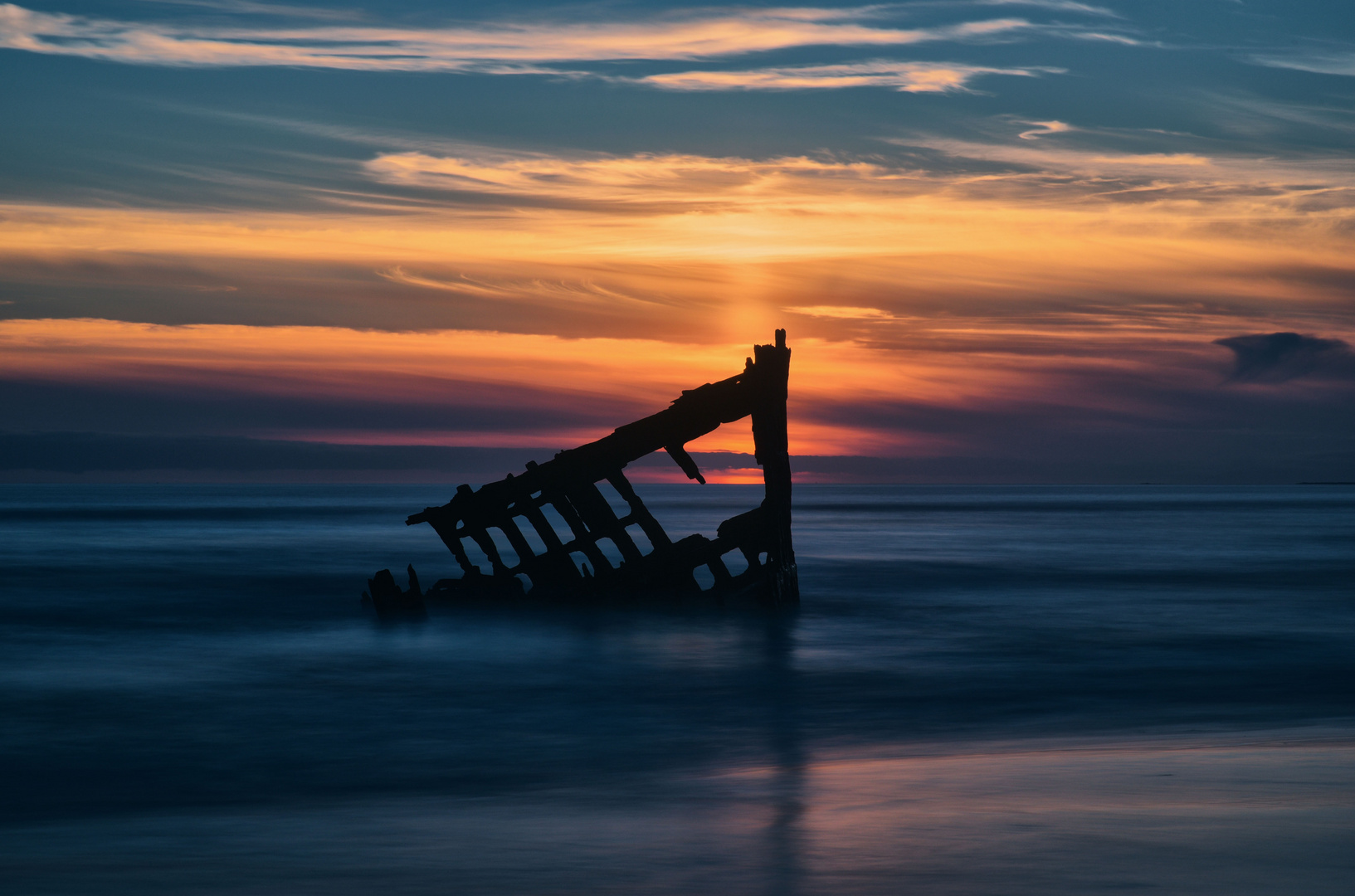 Wreck in sunset