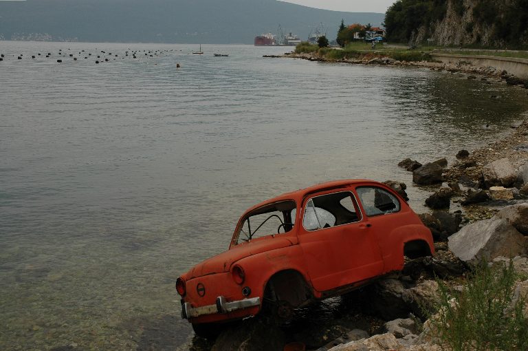 wrecked car at the shore near Bar / Montenegro