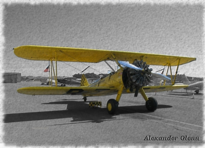 yellow biplane