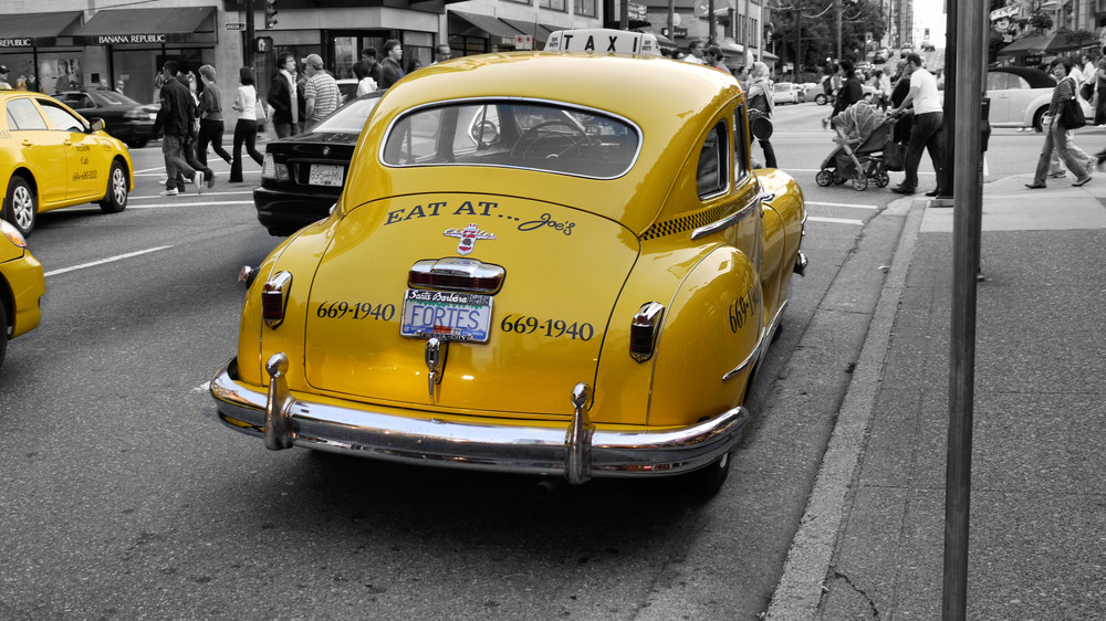 yellow cars in the streets of Vancouver