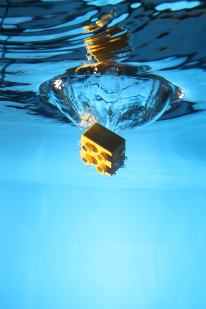 Yellow Lego in water