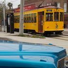 Yellow Retro Tram & Blue Cadillac