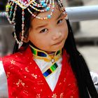 Yi girl in her traditional outfit