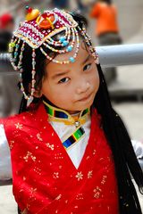 Yi girl in her traditional outfit