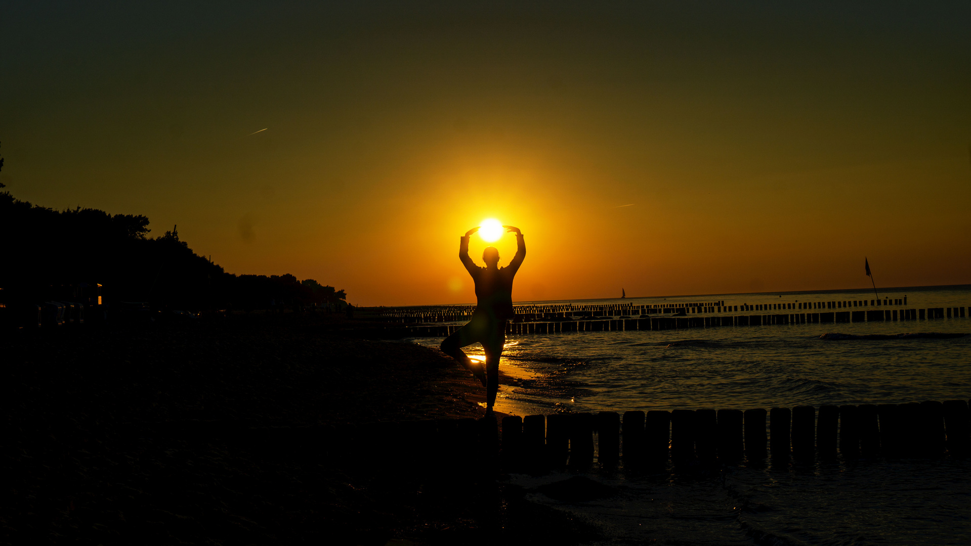 Yoga bei Sonnenuntergang