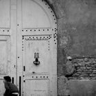 Young boy in the corner of a street