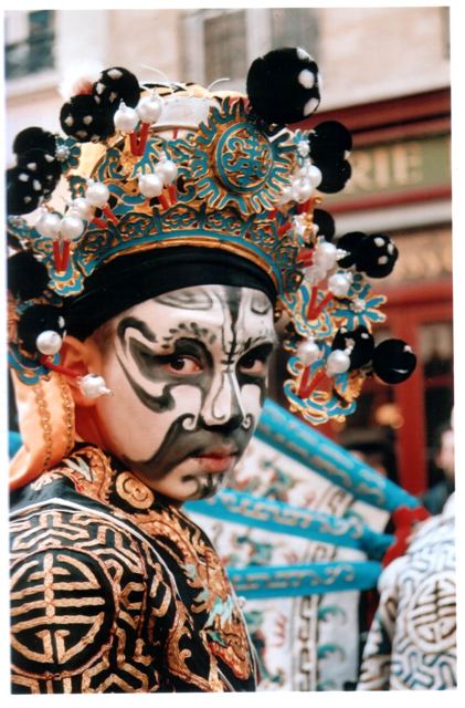 Young Boy With A Mask