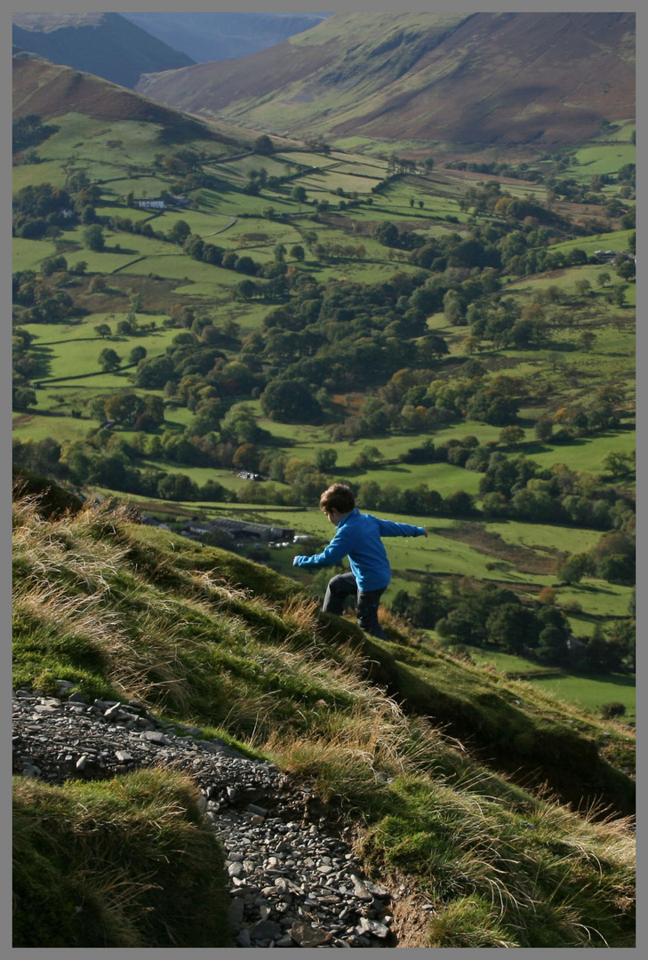 young fell runner on the side of CatBells, English lake district