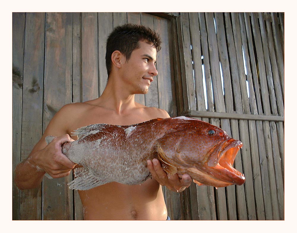 Young Fisherman with Red Snapper
