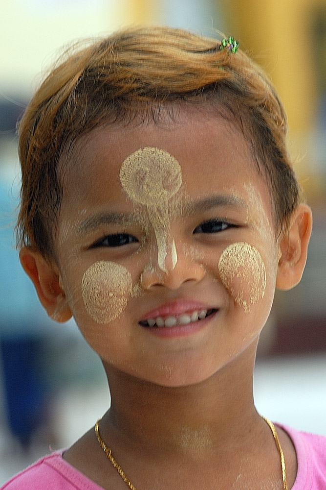 Young ginger boy with his thanaka make up in Rangoon