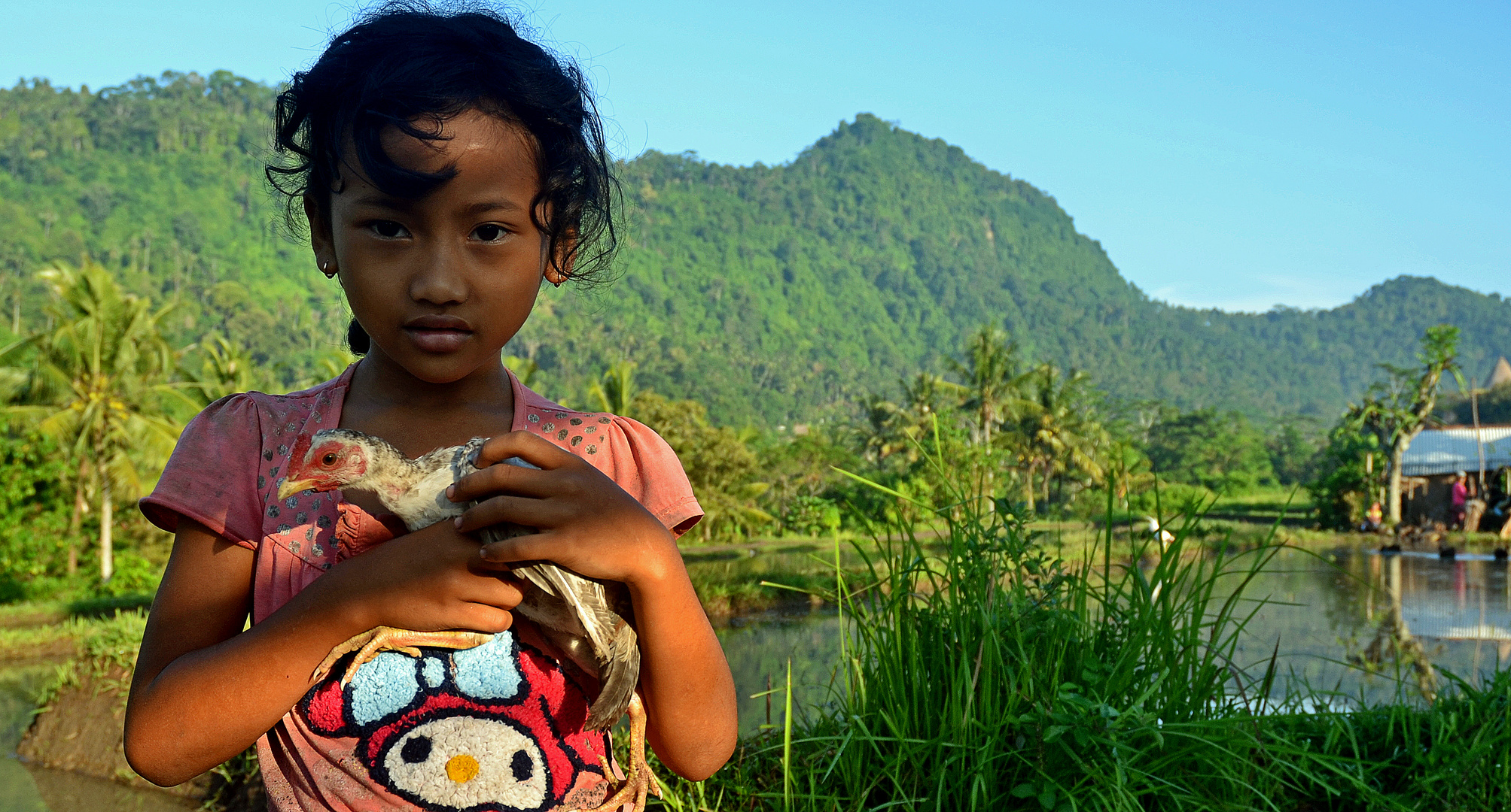 Young girl and her chicken