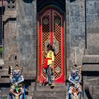 Young girl in front of the entrance gate