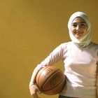Young Jordanian woman with basketball
