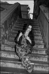 Young lady on the baroque staircase.