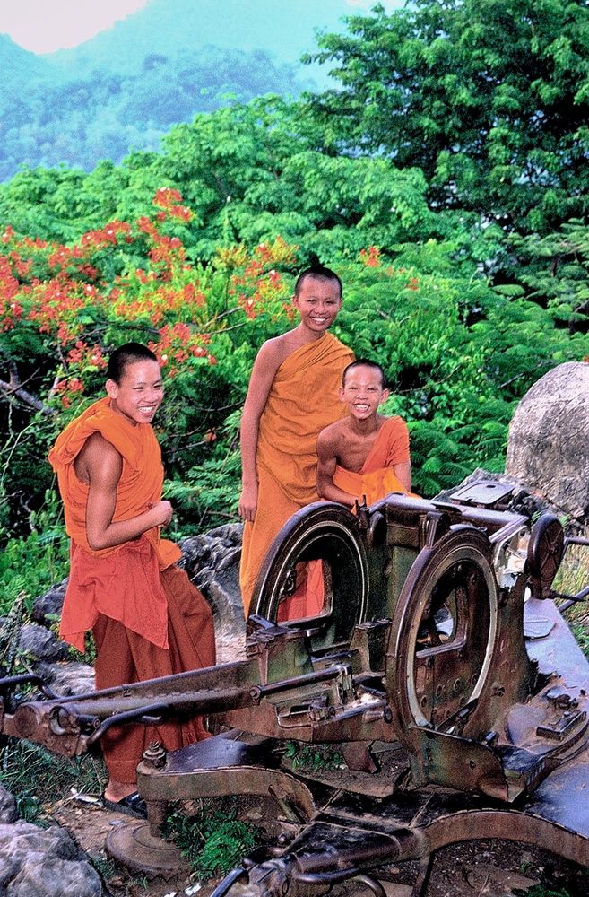 Young monks beside a gun pod cradle