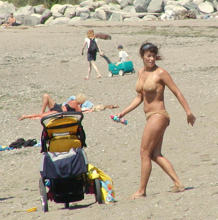 Young mother on the beach