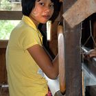 Young Shan girl working on the hand loom