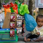 Young vendor at Pura Basukian Puse Jagat