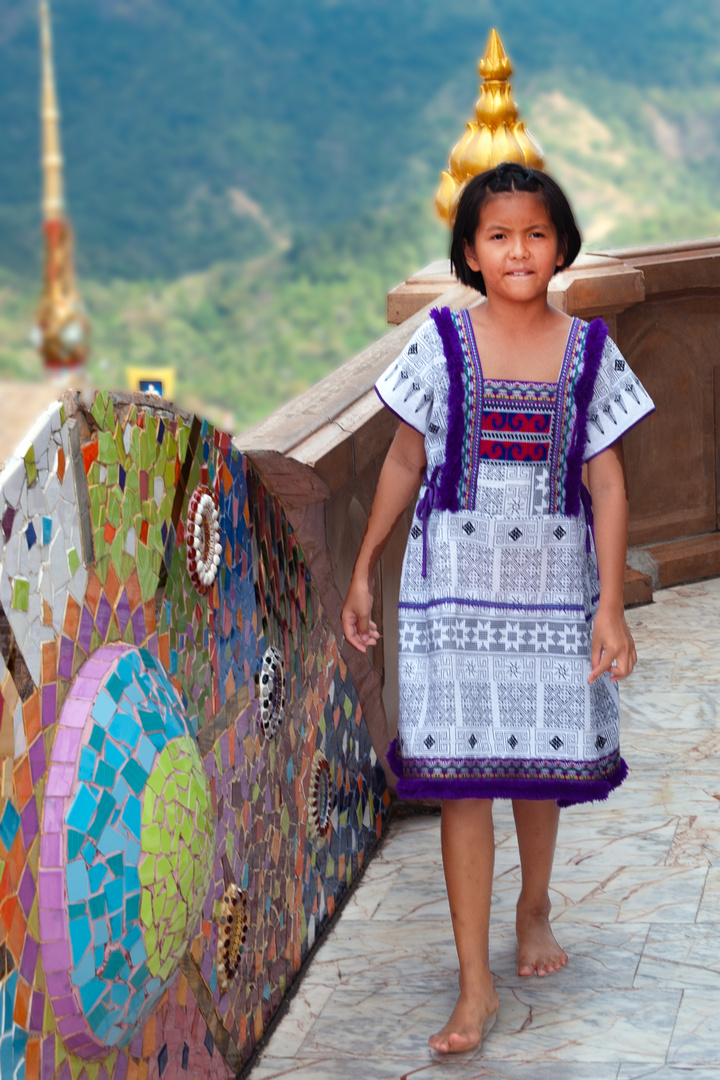 Young visitor in Wat Pha Sorn Kaew