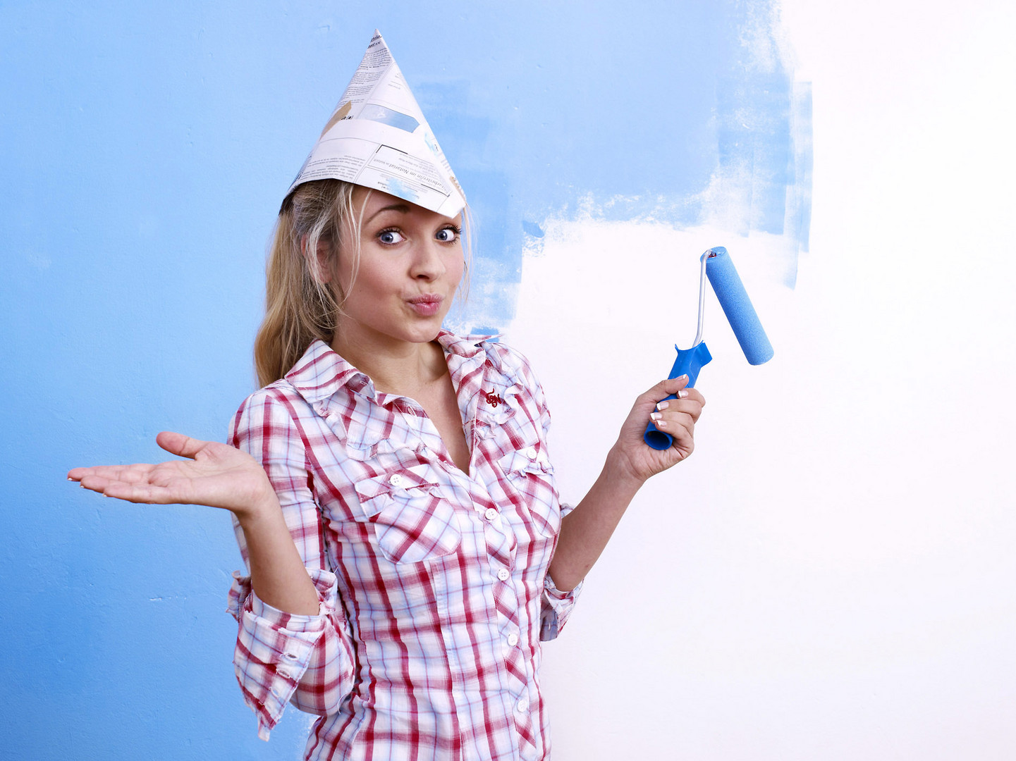 Young woman with paintbrush