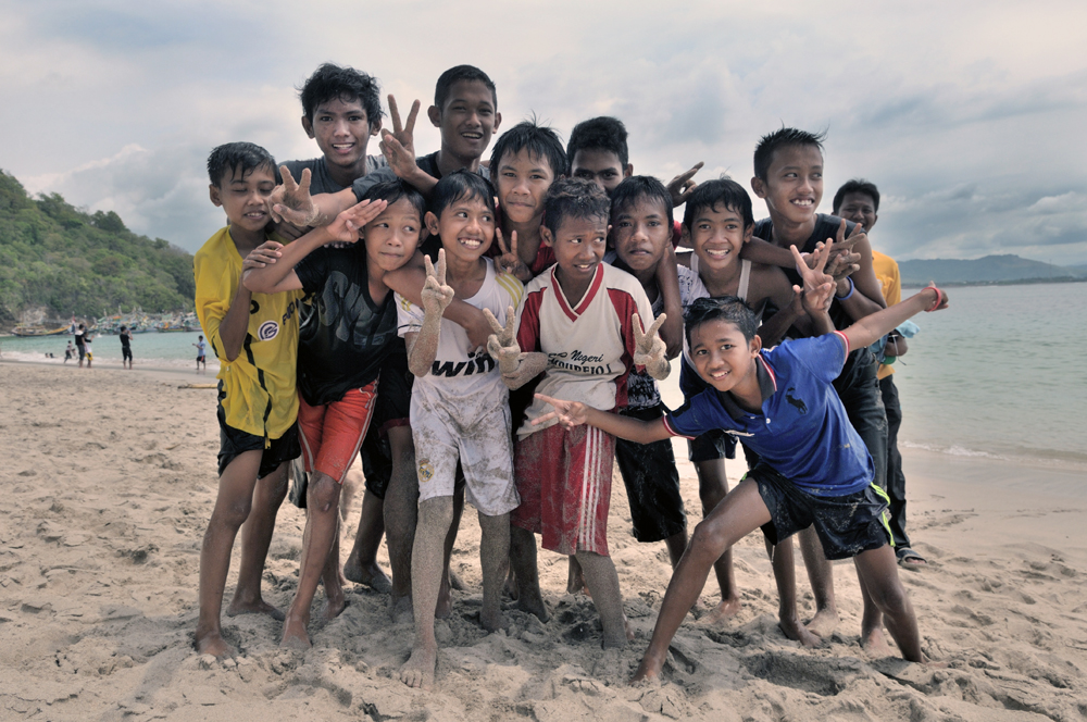 Youngster group present for beach photo