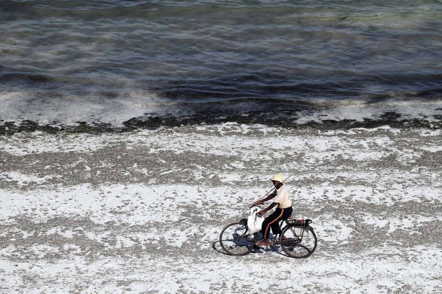 Zanzibar fisher on his bike