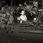 Zebra without and child with thanaka.
